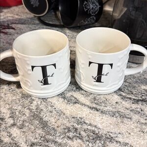 White Monogrammed T Mugs. New without box. “T” printed on both sides.